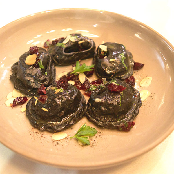 Black varenyky with goose meat and prune Black varenyky with goose meat and prune
